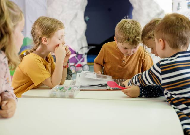 Children choose glitter tattoos