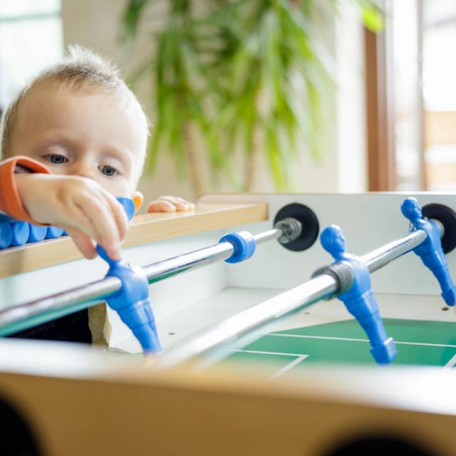 Child discovers table football