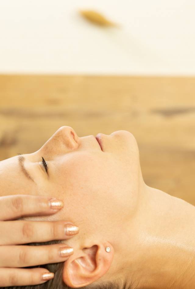 Woman enjoying a head massage