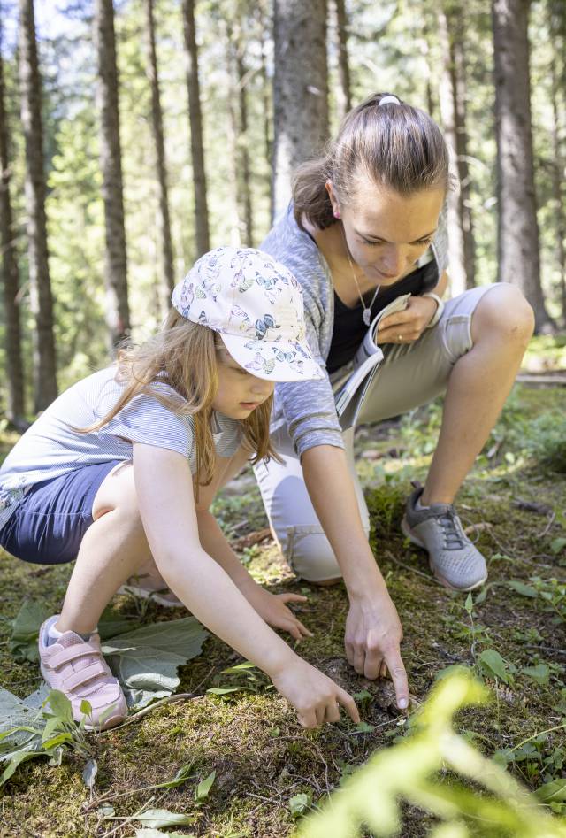 Mother and child in the forest in Berwang