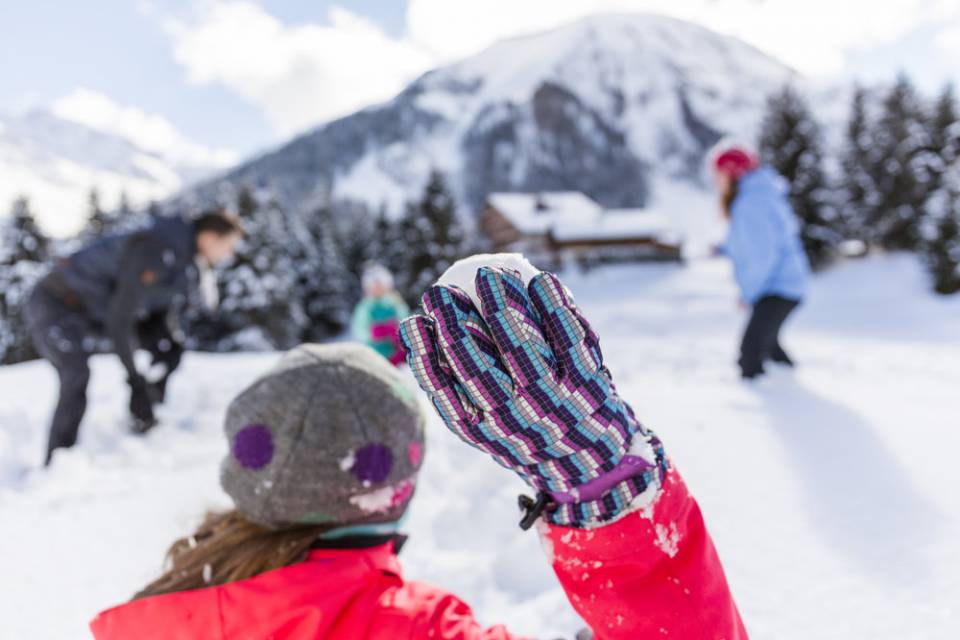 Snowball fight in winter